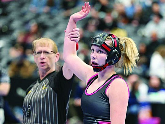 Wells makes school history