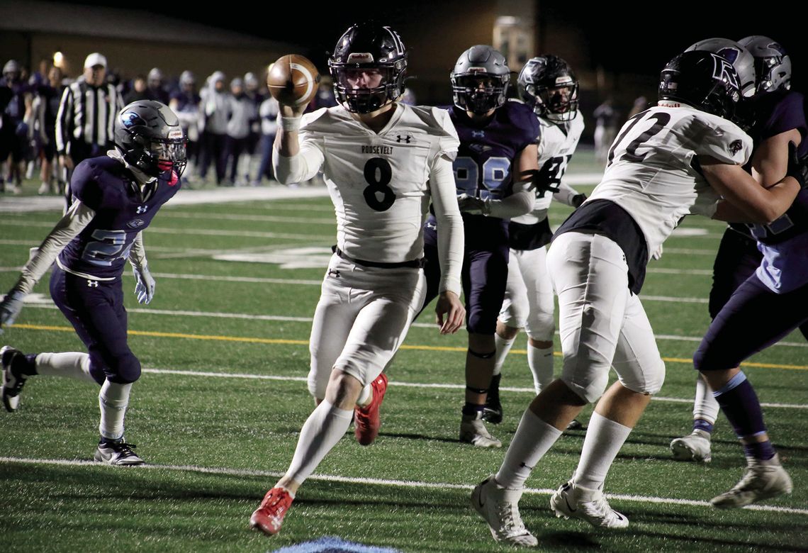 Roosevelt quarterback Bronco Hartson (#8) had a career-rushing day with three rushing touchdowns in the game and two passing touchdowns to help the Rough Riders defeat the Riverdale Ridge Ravens 55-20 this past Friday night in the first round of the CHSAA 3A state football playoffs